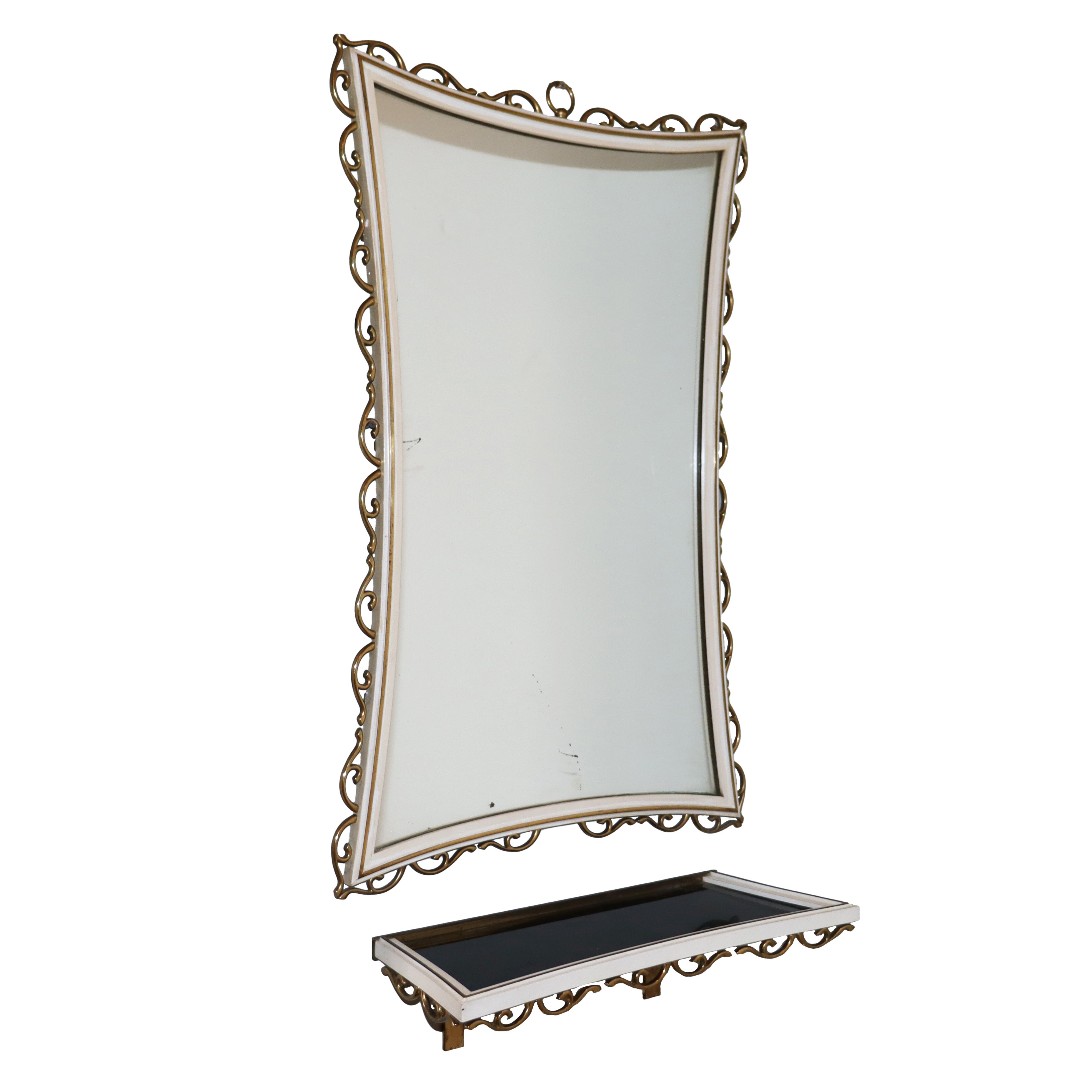 Ivory glazed metal mirror with black opaline shelf, c. 1940