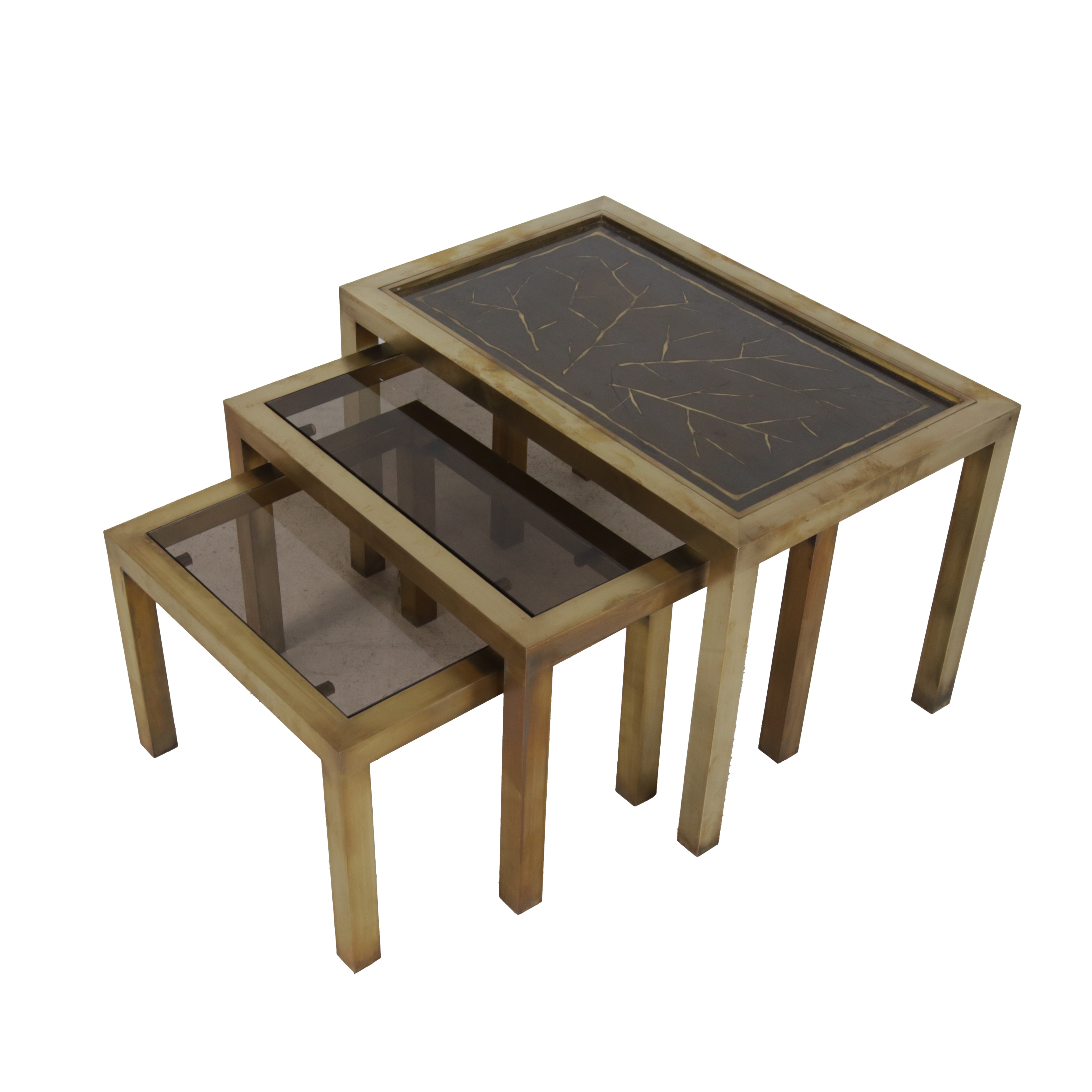 Set of three brass and smoked glass nesting tables with decorative top, c. 1960