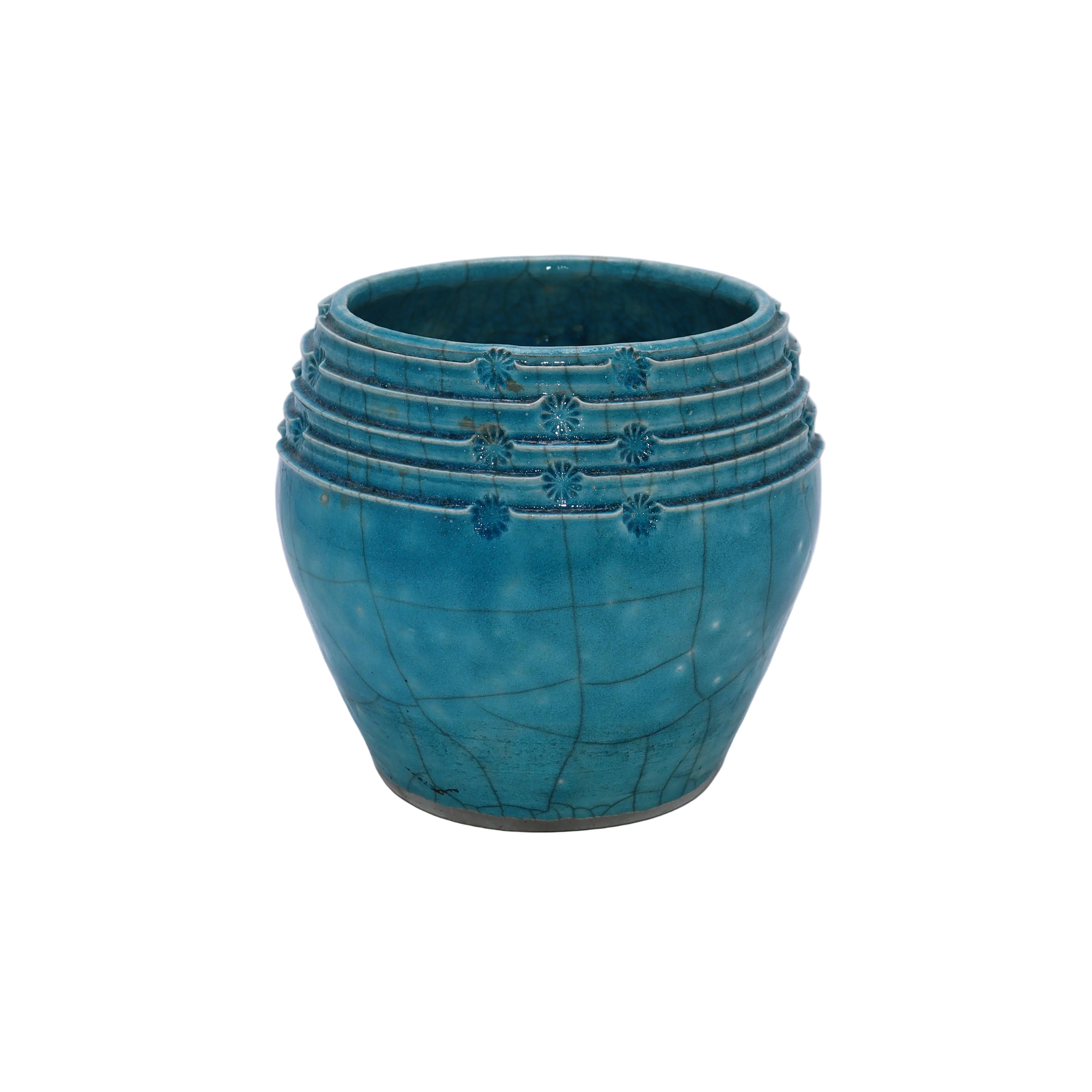 Turquoise Raku porcelain low vase by Ann Alford